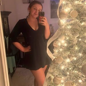 Dark green velvet dress.